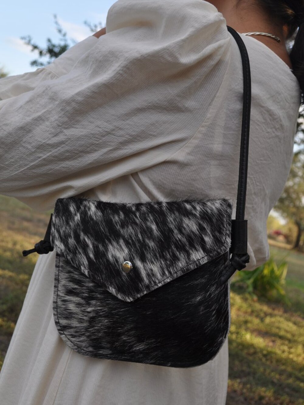🖤 Black & White Cowhide Crossbody Bag — $65